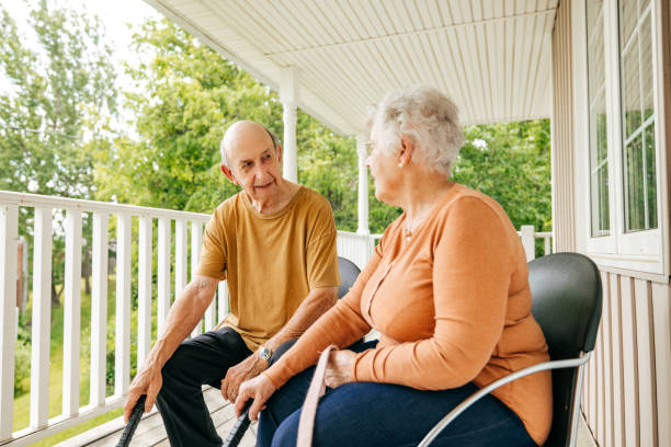 istock Senior couple sitting on the balcony 1324963207