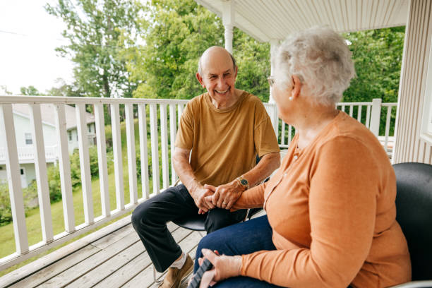 istock Senior couple sitting on the balcony 1324963216