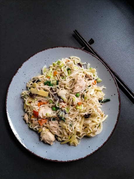 istock Fried Chinese pasta with vegetables and meat 1324978167