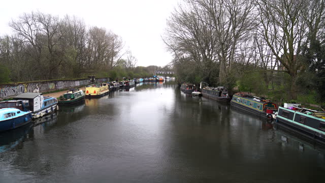 Narrow Boats On The Riverside In London