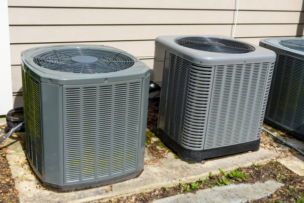 istock Home air conditioning units outside residential home 1324981616