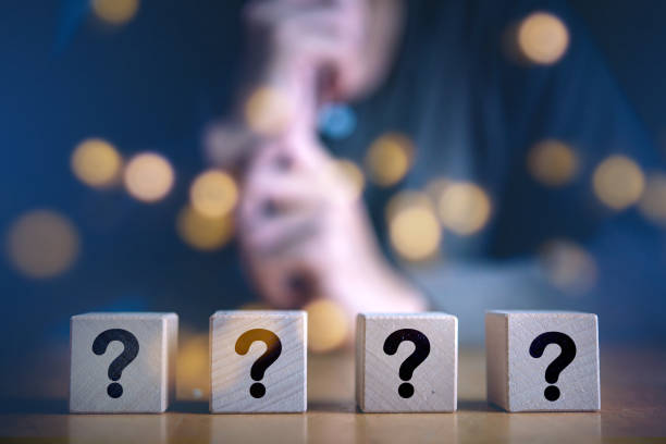 istock Businessman analyzing business service questionare which print screen on wooden cube block, Satisfaction concept.Selection & Choosing emotion or mood concept. 1324986056