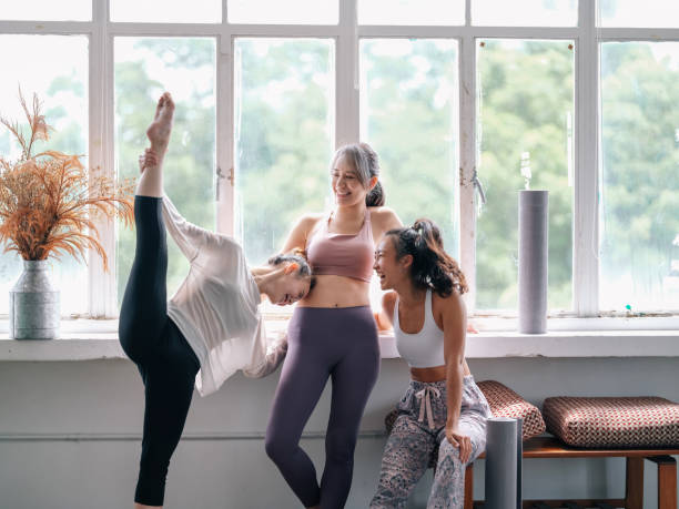 group of girls yoga and heathy living group of girls yoga and heathy living heathy stock pictures, royalty-free photos & images