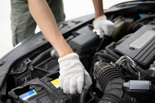 istock Cropped shot of mechanics working in auto service. 1324991428
