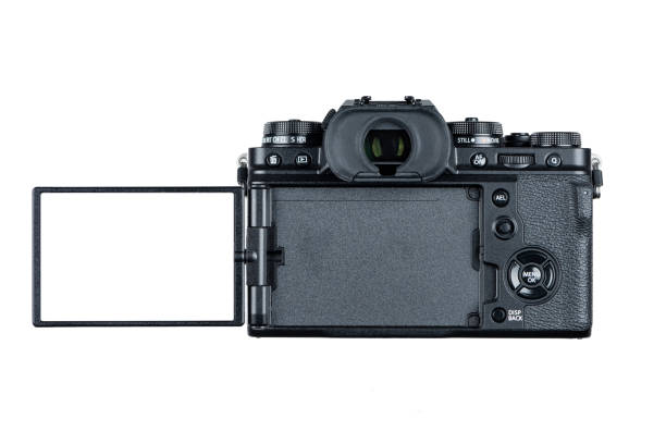 istock Vintage looking modern mirrorless camera isolated on white background rear view 1324993567