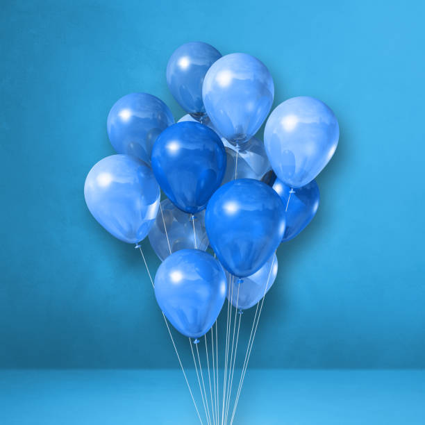 istock Balloons bunch on a blue wall background 1324994531
