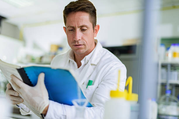 istock Scientist reading medical data in laboratory. 1324995690