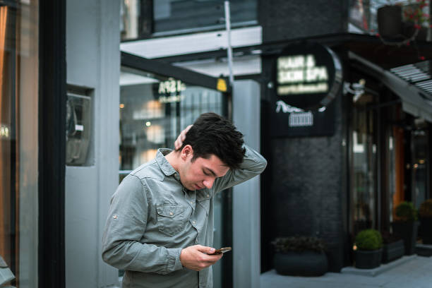 istock customer communicating with ceramics store and looking at the map on the cell phone how to find 1324996505