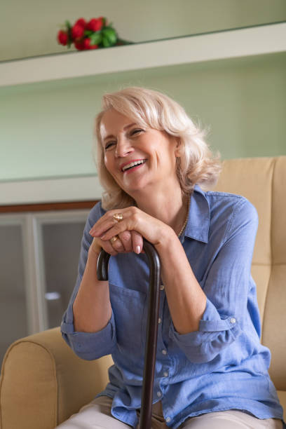 istock Senior Woman is Sitting at Home in Deep Thoughts. 1324997543