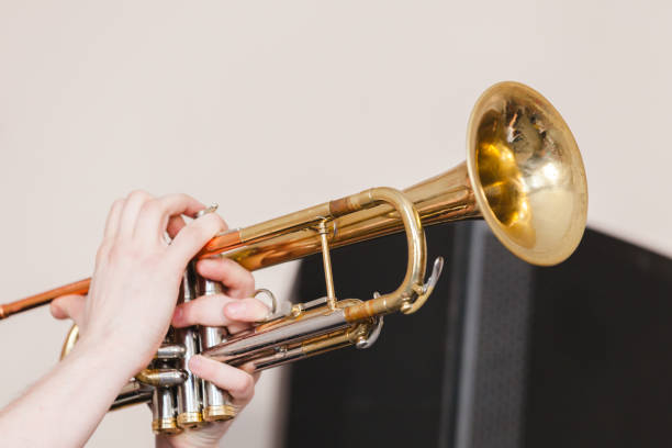Trumpet in musician hands