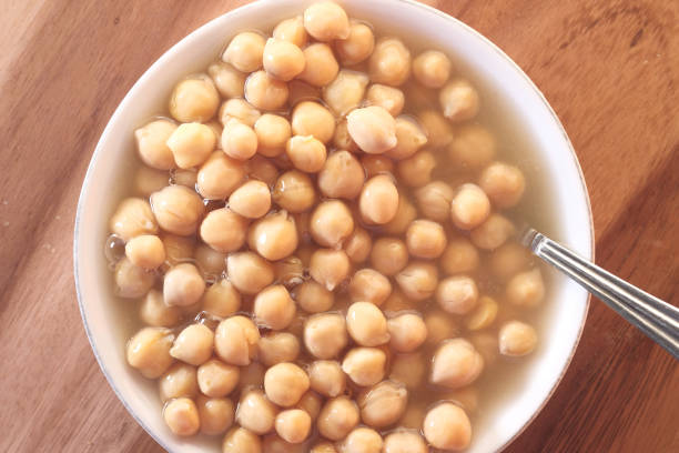 istock chick peas in a bowl on white background 1325005432