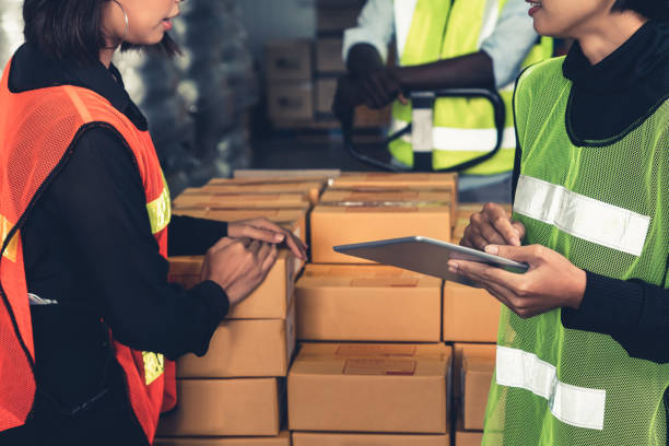 istock Warehouse worker working together in the storehouse 1325007211