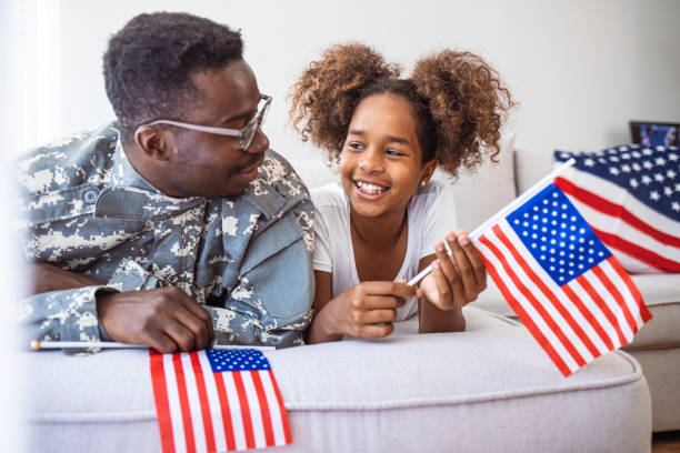 istock Soldier reunited with his daughter. 1325009492