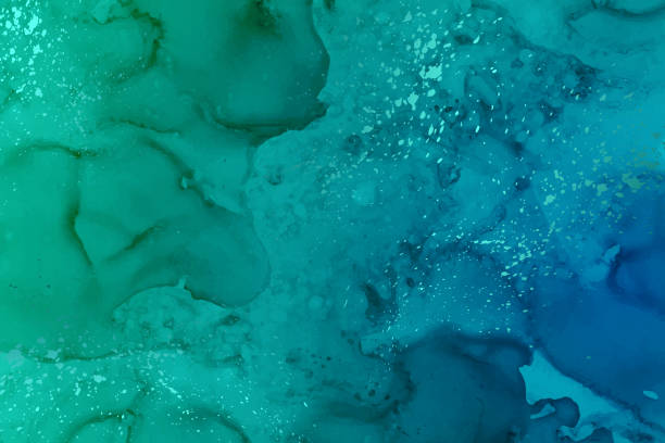 istock Watercolor background with abstract blue and green ink waves and splashes. 1325010995