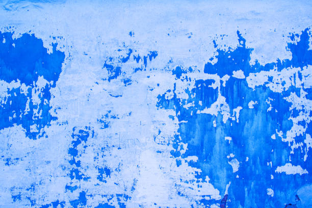 istock Dark Plaster Wall With Dirty White Black Scratched Horizontal Background. Old Brickwall With Peel Grey Stucco Texture. Retro Vintage Worn Wall Wallpaper. Decayed Cracked Rough Abstract Banner Surface. 1325011411