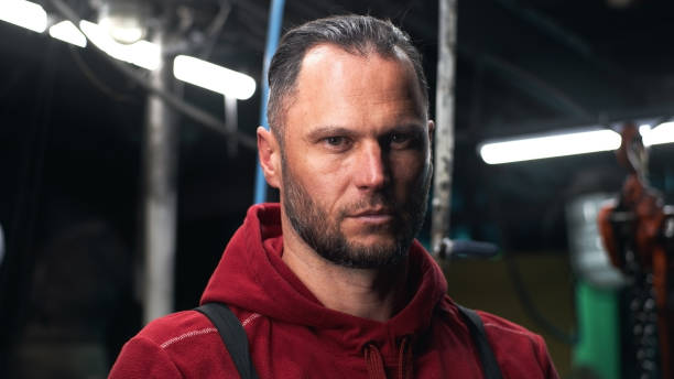 istock Serious male fisher looking at camera 1325015832