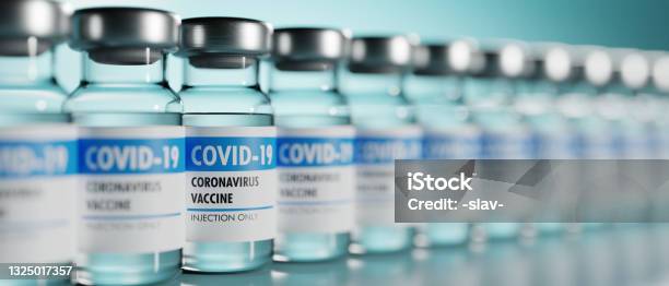 Row Of Coronavirus Vaccine Flasks Shallow Depth Of Field Stock Photo - Download Image Now