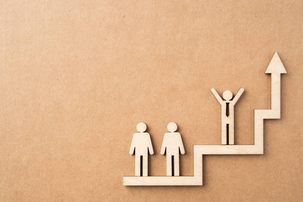 istock wooden businessman with leadership concept 1325021492