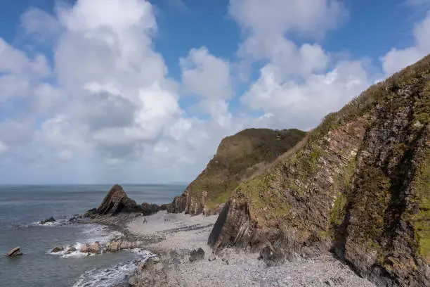 Stunning aerial drone flying landscape image of Blackchurch Rock on Devonian Geological formation in England