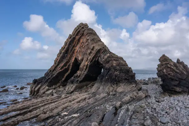 Stunning aerial drone flying landscape image of Blackchurch Rock on Devonian Geological formation in England