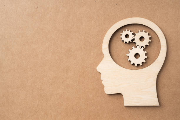 istock wooden businessman and human brain, idea concept 1325022564