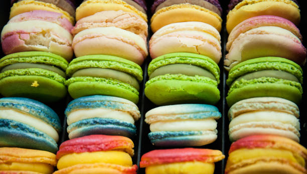 istock Macaroons in a box. Traditional French dessert as a background 1325025318