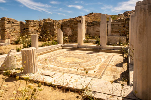 ancient mosaic on the floor of the house of the dolphins on delos island, greece. - mosaic greek culture mythology ancient imagens e fotografias de stock