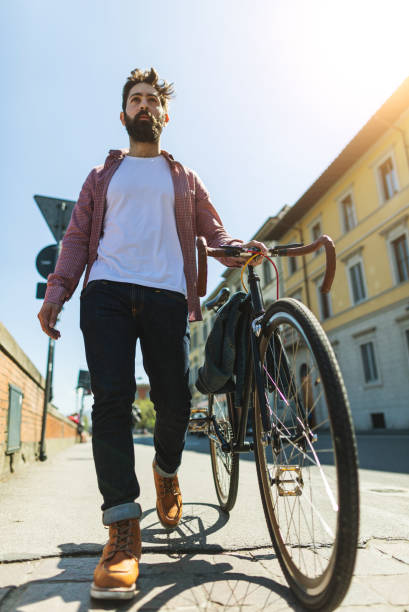 istock Hipster stylish man with bicycle in Florence, Italy 1325027341