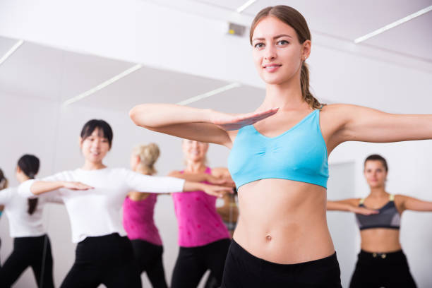 istock Group of smiling people of different ages dancing 1325029970