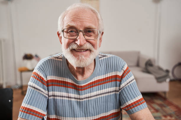istock Man wearing glasses sharing positive emotions while posing to the camera 1325030068