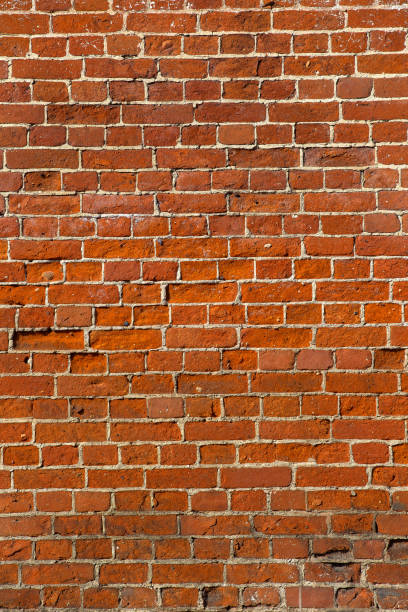 istock old texture wall made of colored and white bricks, background, grunge 1325031393