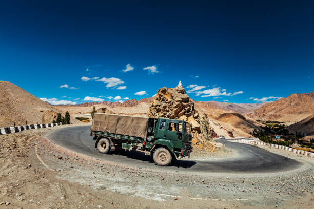 istock Indian army lorry on road in Himalayas 1325036076