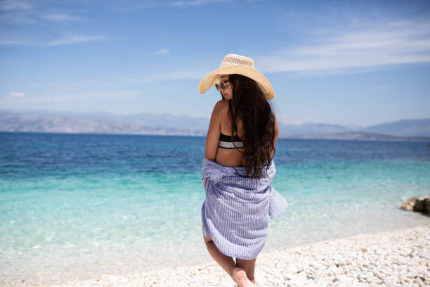 istock Dreamy girl on beach 1325038987