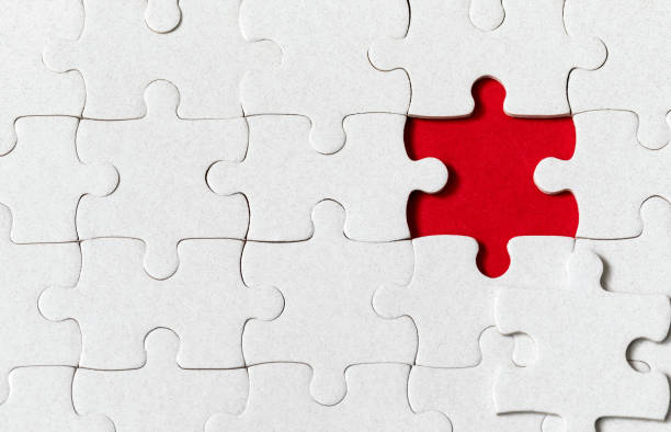 istock White jigsaw puzzle. White puzzle pieces on color background. Unfinished white jigsaw puzzle pieces on color background. 1325039351