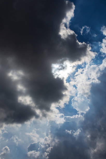 istock Blue sky and cottony clouds 1325040671