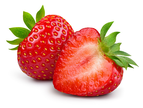 Strawberries isolated. Strawberry whole and half on white. Side view. Full depth of field. With clipping path.\