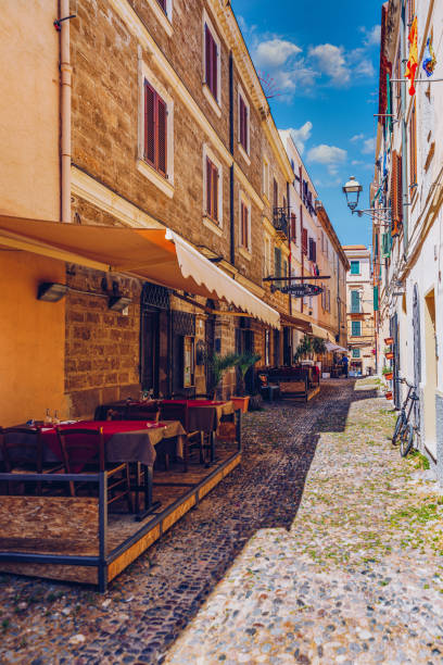 istock Alghero old town, Alghero street view on a beautiful day. Alghero, Italy. Panoramic aerial view of Alghero, Sardinia, Italy. 1325043698