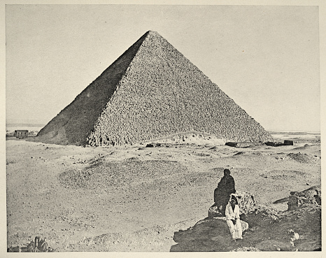 Antique photograph of the Great Pyramid of Giza, Egypt, 19th Century. Also known as the Pyramid of Khufu or the Pyramid of Cheops is the oldest and largest of the pyramids in the Giza pyramid complex bordering present-day Giza in Greater Cairo, Egypt. It is the oldest of the Seven Wonders of the Ancient World, and the only one to remain largely intact.