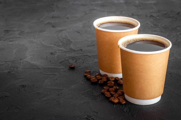 istock Roasted beans and take away coffee in paper cup 1325052652