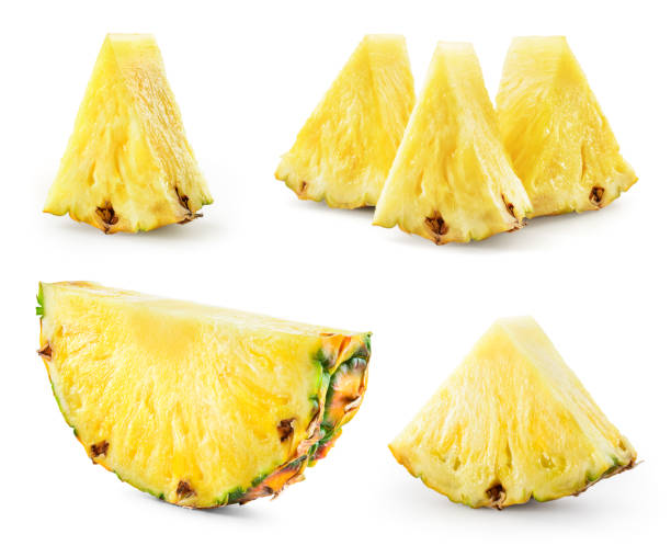 istock Pineapple slices isolate. Cut pineapples on white. Fresh pineapple set. Full depth of field. 1325055736