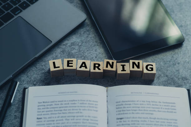 istock Laptop, tablet, and book or textbook. Self learning or education knowledge and business studying concept. Idea of learning online class or e-learning at home. 1325056483