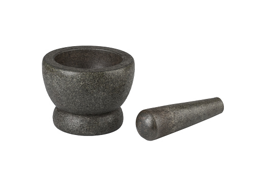 Thailand native stone mortar & pestle isolated on white background with clipping path. Stone mortars are important for Thai food and used in Thai kitchens.