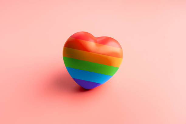 istock LGBTQ flag and symbol on table top view 1325067161