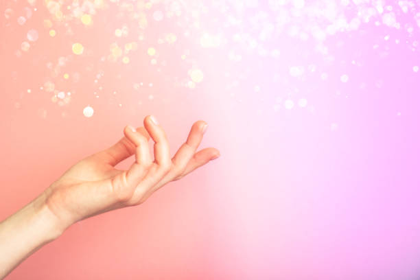 istock Female hand isolated on multicolored neon background with blur 1325067488