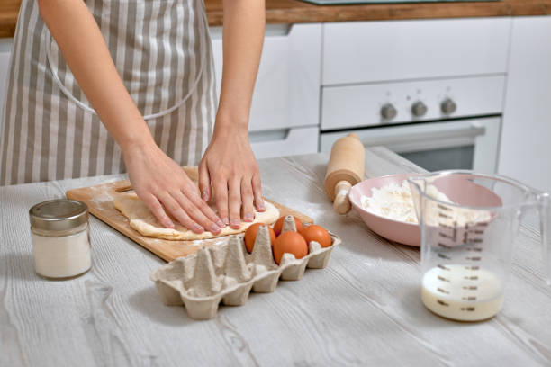 istock housewife cooking on kitchen at the home. 1325070573