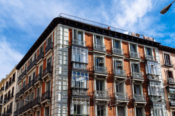 Low Angle View of Old Residential Building in Central Madrid. Real Estate market and rent regulation concepts