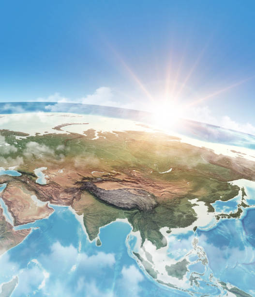 istock Sun shining in blue sky over the Earth 1325073415