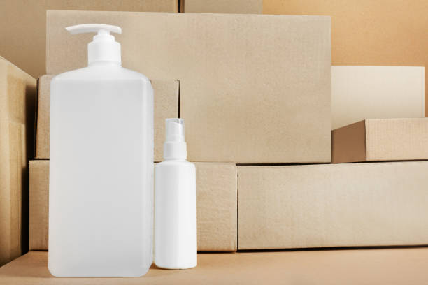istock Sanitizer bottle products standing on stacked cardboard boxes 1325074599