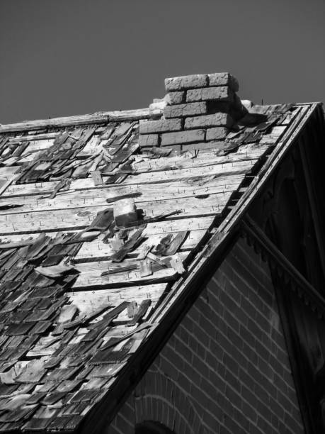 istock Broken Roof in Black and White 1325077118