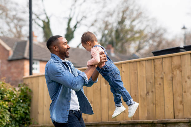 istock Father & Son Playing in the Garden 1325080520
